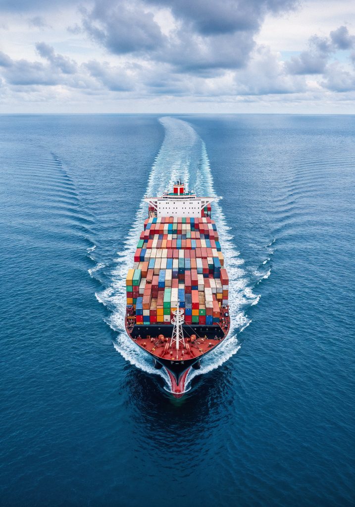 Cargo ship sailing through the ocean